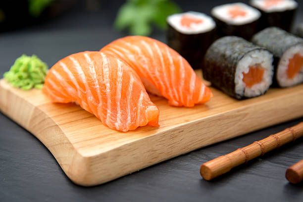 istock Sushi Nigiri with fresh salmon and Maki roll 512056698
