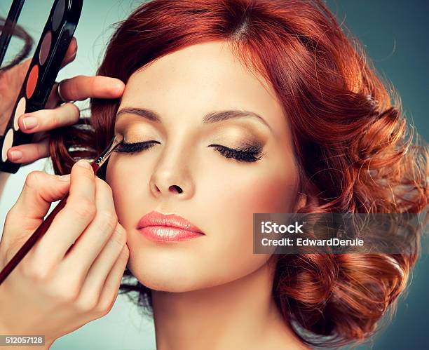 Pretty Redhaired Girl With Curlsmakeup In Process Stock Photo - Download Image Now
