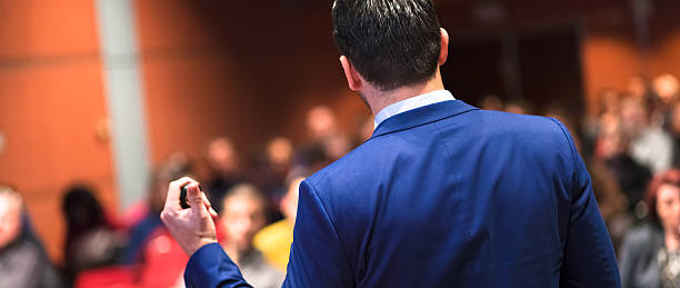 istock Public speaker giving talk at Business Event. 512058216