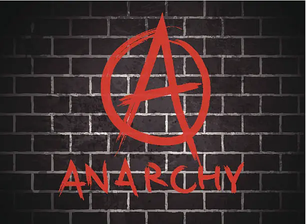 Vector illustration of Brickwall and sign of anarchy written over it