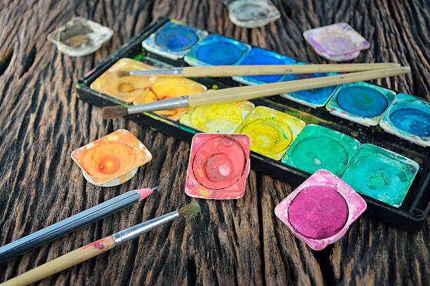 istock Water color paint box and paint brush 512058459
