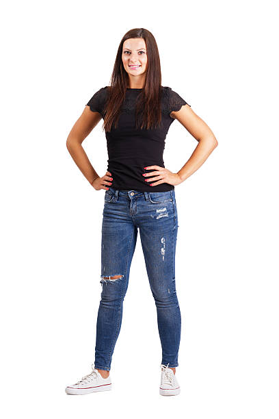 istock Beautiful young brunette woman with arms on her hips. 512061455