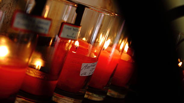 istock Glass Encased Votive Candles 512081051