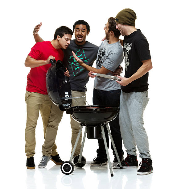 istock Social group of young men having a BBQ 512082007