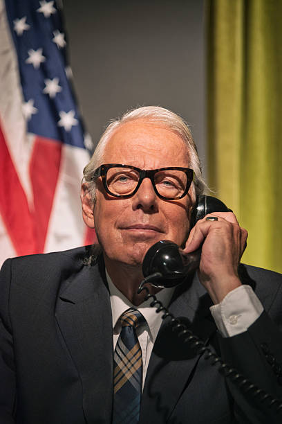 istock Big boss president wearing glasses calling behind desk. 512082221