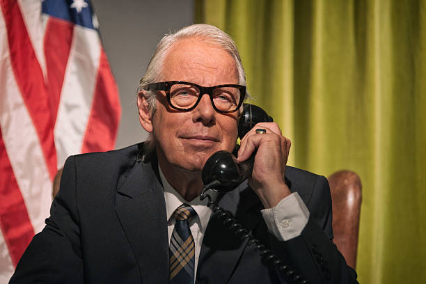istock Big boss president wearing glasses calling behind desk. 512082223