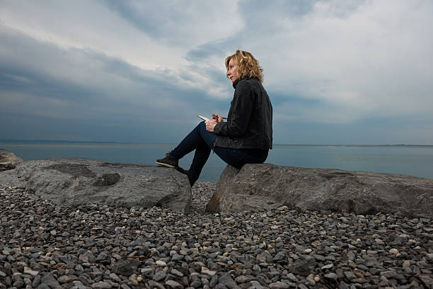 istock Poet by the sea 512082579