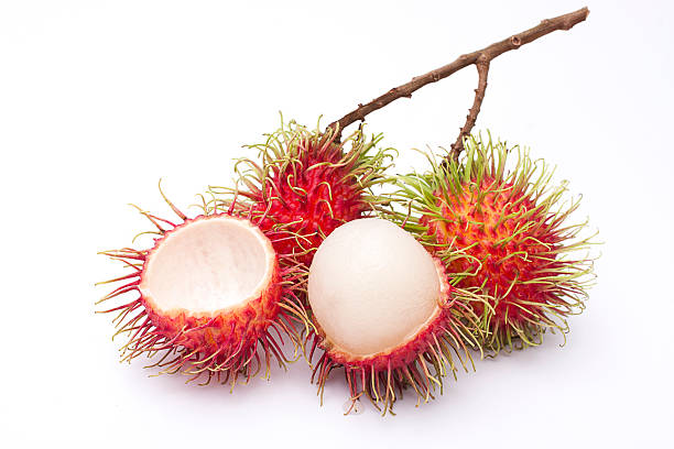 rambutan frutta fresca - rambutan foto e immagini stock