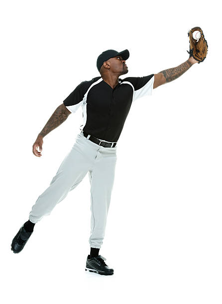istock Male baseball fielder in action 512085311
