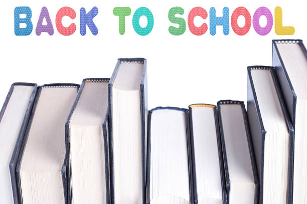 istock Back to school message and a stack of hardcover books 512085385
