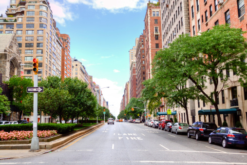 HDR (photorealistic) image of Manhattan Upper East Side, New York City. Image shows Park Avenue and taken at E 84th street. Wide angle lens.