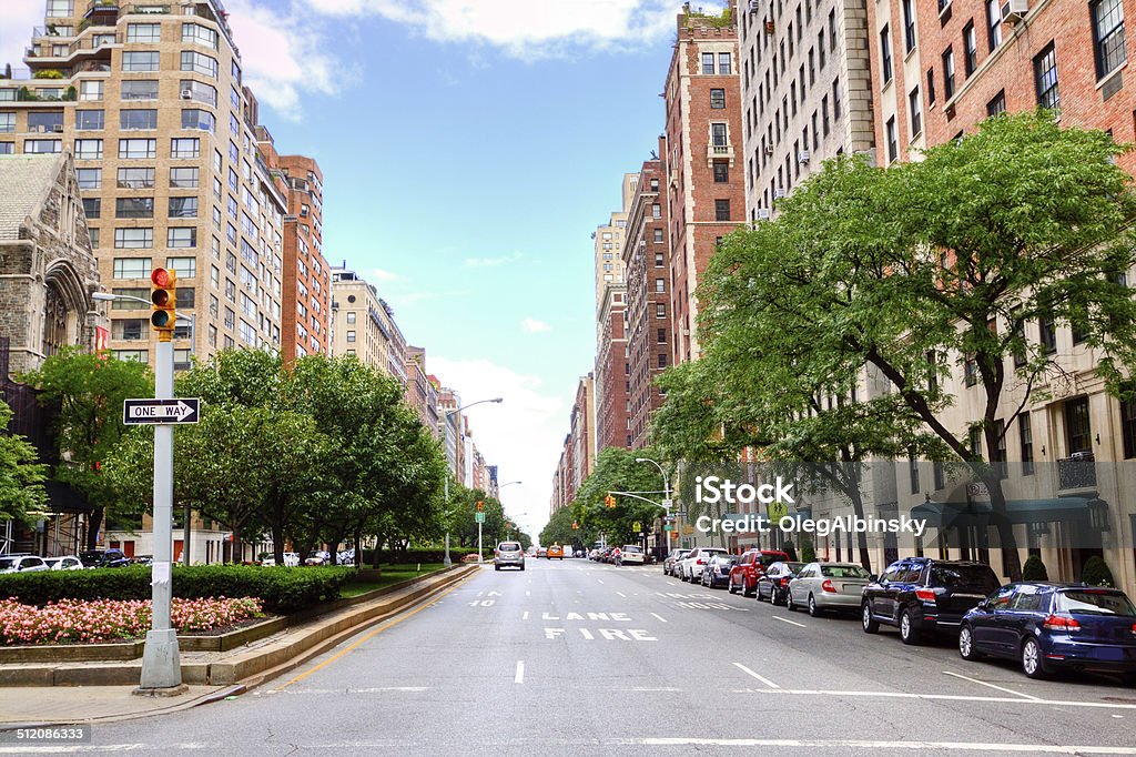 Park Avenue, Manhattan Upper East Side, New York City. HDR (photorealistic) image of Manhattan Upper East Side, New York City. Image shows Park Avenue and taken at E 84th street. Wide angle lens. New York City Stock Photo