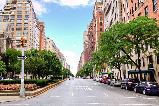 Park Avenue, Manhattan Upper East Side, New York City. HDR (photorealistic) image of Manhattan Upper East Side, New York City. Image shows Park Avenue and taken at E 84th street. Wide angle lens. upper east side manhattan stock pictures, royalty-free photos & images