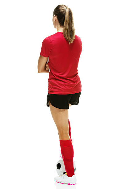 istock Rear view of soccer player standing with ball 512087195
