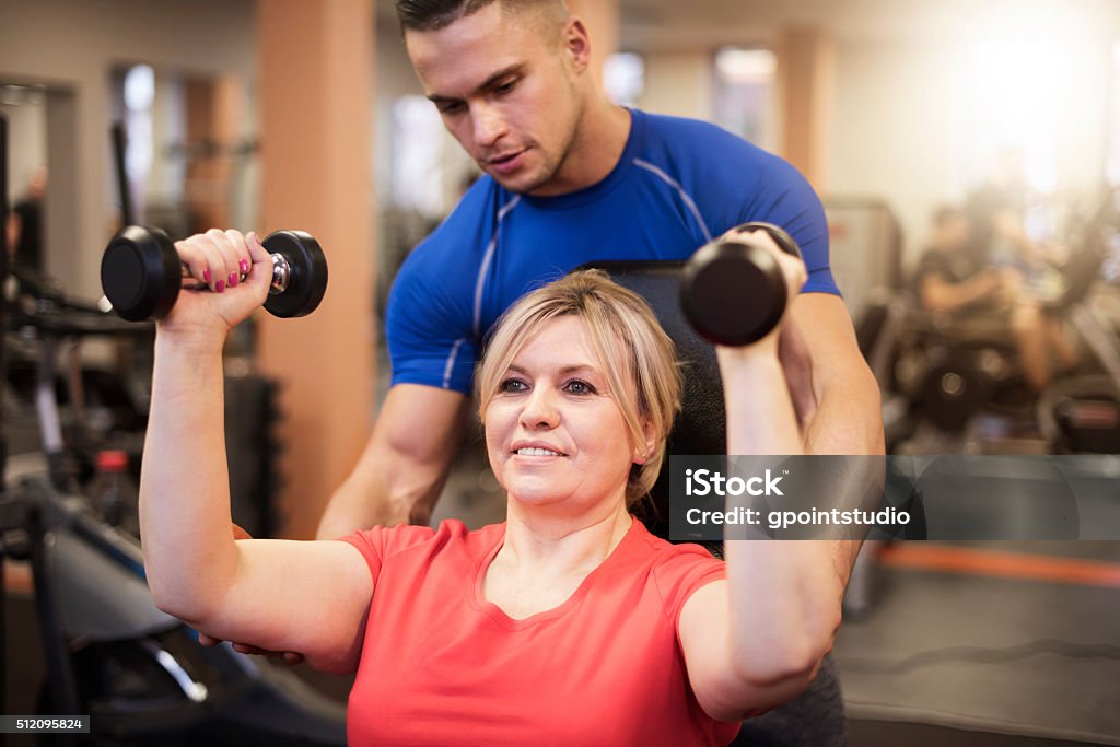 Workout with personal trainer Coach Stock Photo