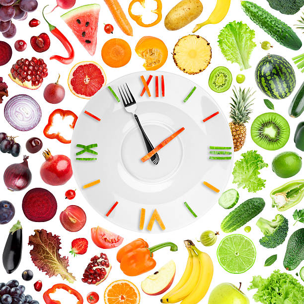 istock Food clock with fruits and vegetables 512096910