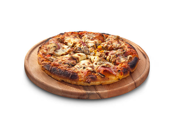 istock pizza with ham, mushrooms and cheese on chalk board 512100079