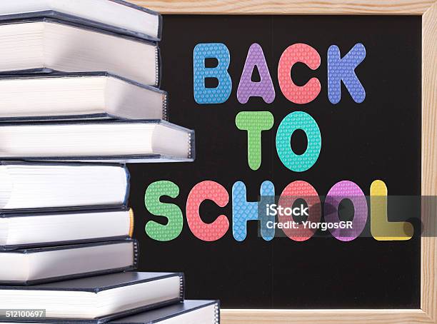 Back To School Message And A Stack Of Hardcover Books Stock Photo - Download Image Now