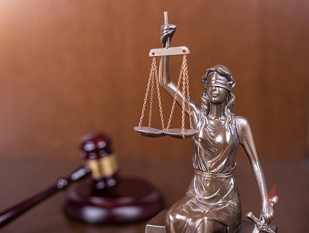 istock justice and Wooden gavel,law concept 512103018