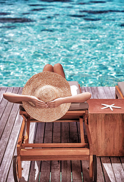 istock Luxury female on the beach 512103415