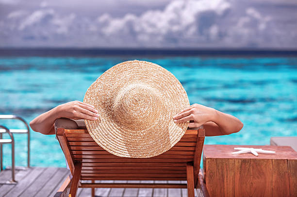 istock Luxury female on the beach 512103419