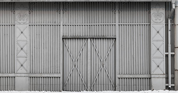 istock Old storage building wall made of ridged steel 512105534