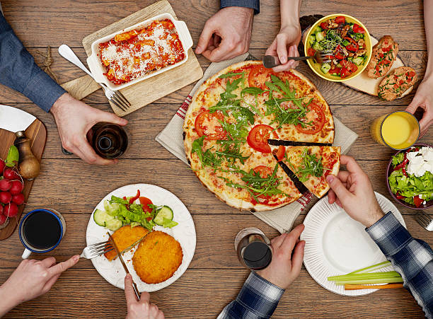 View from above the table of friends eating