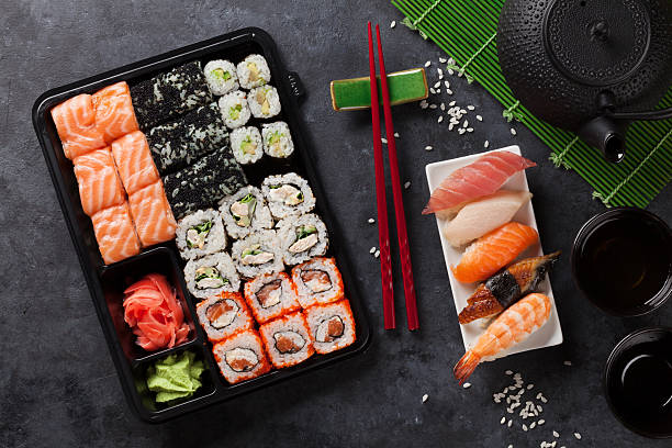 istock Set of sushi and maki roll and green tea 512109890