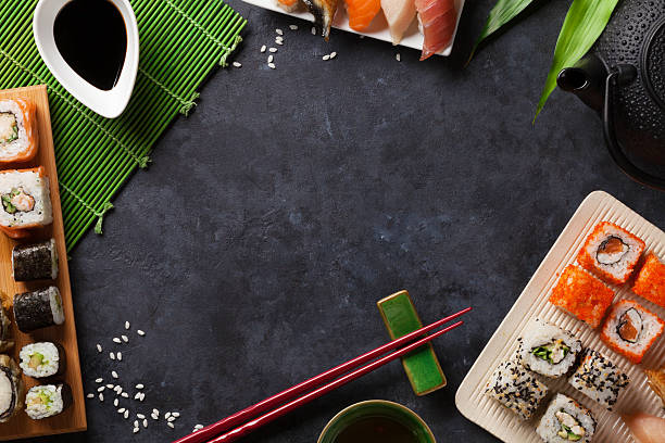 istock Set of sushi and maki roll and green tea 512110080
