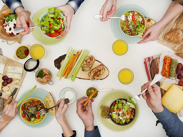 istock View from above of friends having dinner 512111908