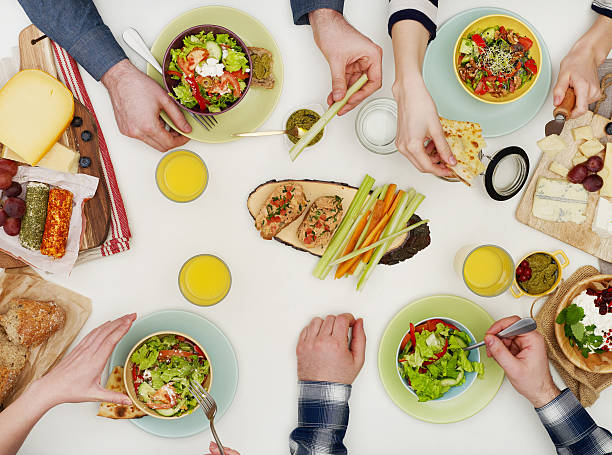 istock View from above of friends having dinner 512114768