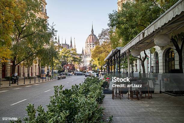 Street Of Budapest With View At The Hungarian Parliament Stock Photo - Download Image Now