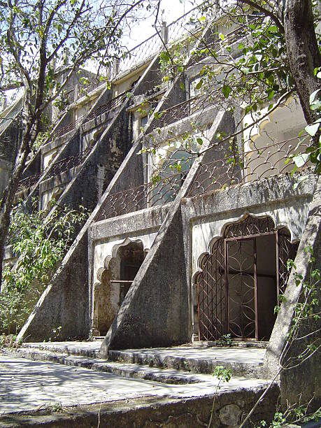 I visited this abandoned ashram in India back in 2005. After years of being abandoned, the jungle overtook the one pristine space used for teaching Transcendental Meditation.