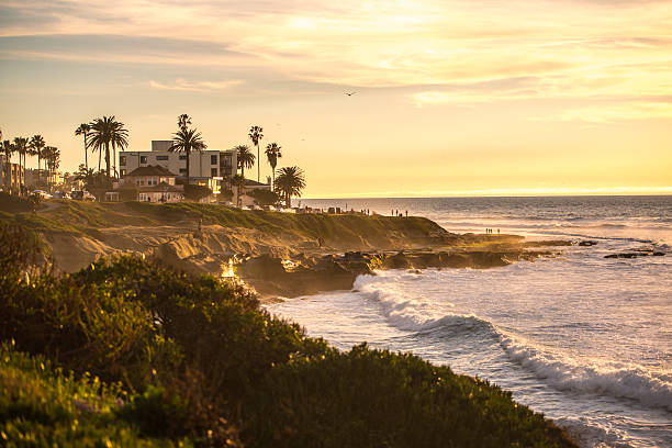 istock People enjoying sunset on La Jolla Beach, California, USA 512116572