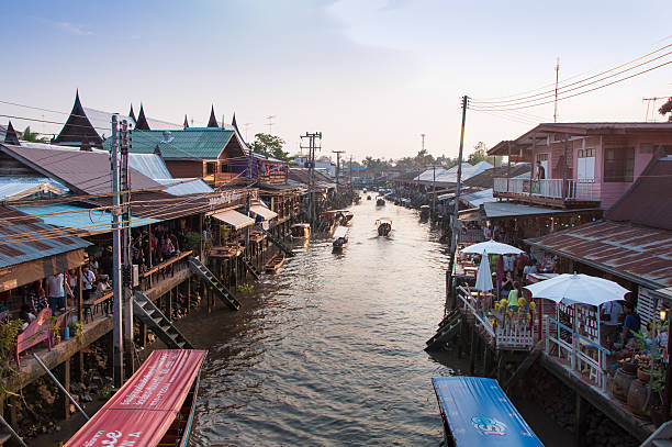 istock The Ampawa floating market on sunset time 512116906