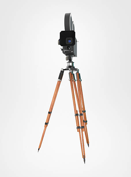 istock vintage retro movie camera tripod mount isolated on white high 512117868