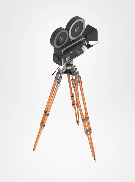 istock vintage retro movie camera tripod mount isolated on white high 512118094
