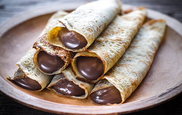 Crepes with chocolate cream Crepes with chocolate cream crepe stock pictures, royalty-free photos & images