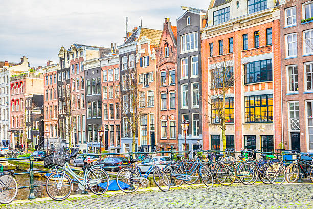 Amsterdam canal and bicycles Amsterdam canal and bicycles jordaan amsterdam stock pictures, royalty-free photos & images