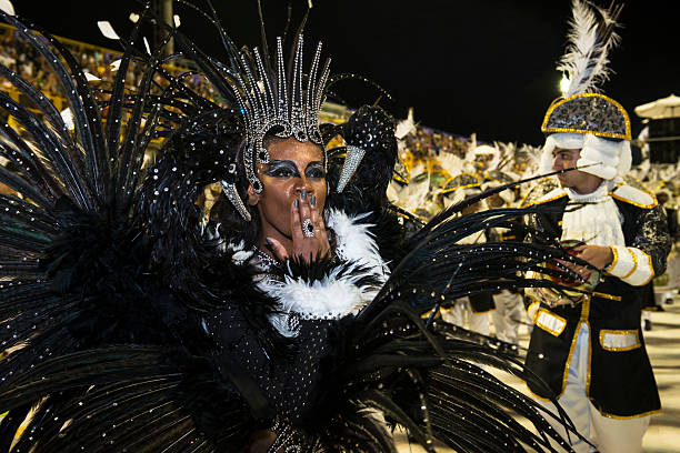 Carnival 2016 Florianópolis, Brazil - February 07, 2016: A close-up of the samba band godmother, from a local samba school called "Os Protegidos da Princesa", performing during the 2016 Carnaval Parade at the sambadrome in Florianópolis, Santa Catarina State - Brazil kiss entertainment group stock pictures, royalty-free photos & images