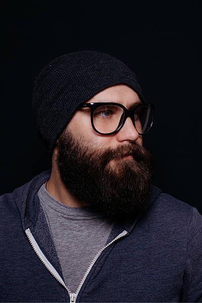 istock Handsome male big beard in glasses and hat 512123188