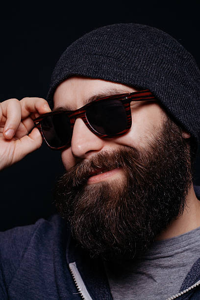 istock Handsome male big beard in glasses and hat 512124002