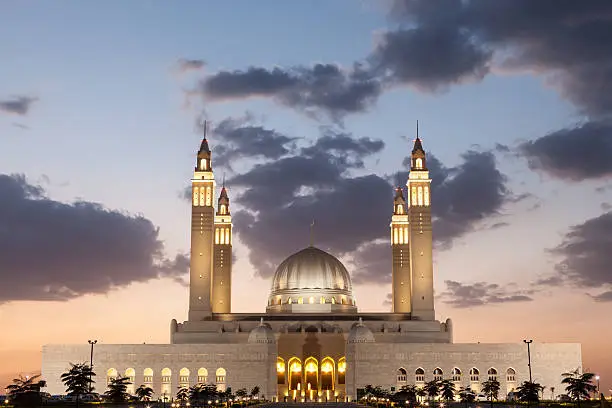Grand mosque in Nizwa illuminated at night. Sultanate of Oman, Middle East