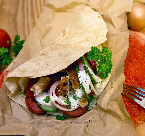 istock Tortilla wrap with chicken breast and vegetables. 512124134