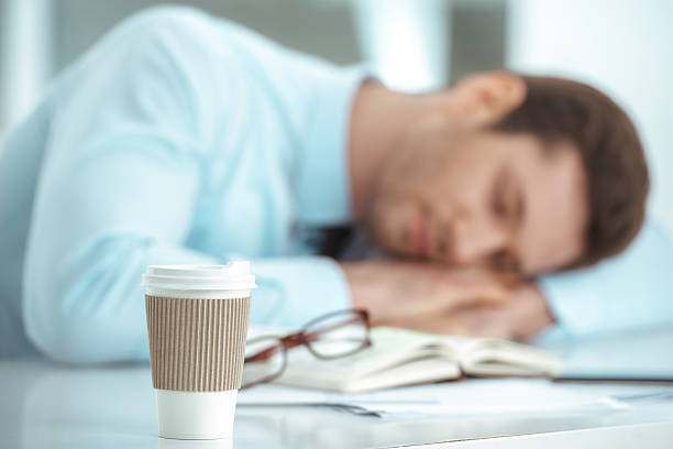 istock Young businessman in office with big window 512125168