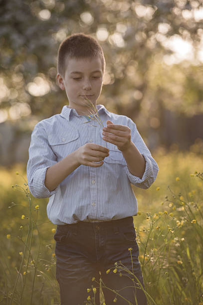 istock Little Boy Playing In The Nature 512127971