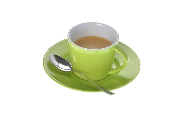 istock cup of espresso coffee with silver spoon on white background 512131255