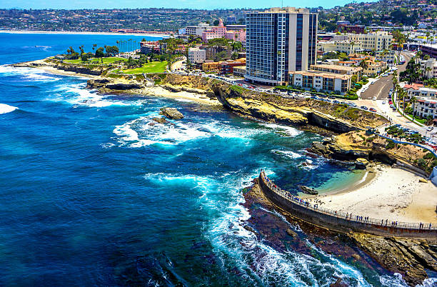 La Jolla and Children's Pool Aerial Aerial view from ocean looking back at La Jolla and Children's Pool la jolla stock pictures, royalty-free photos & images