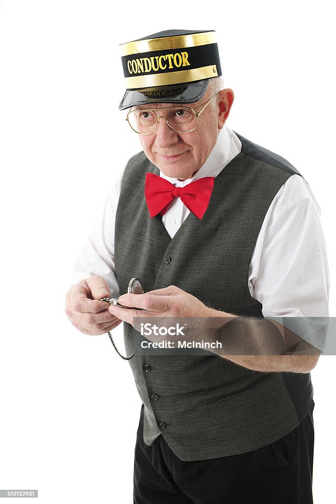 Right on Time! A senior adult conductor holding his pocket watch and looking pleased that the train is coming right on time.  On a white background. Train Conductor Stock Photo