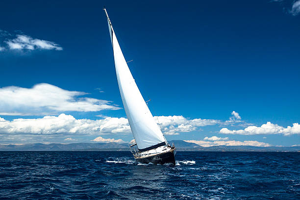 istock Yachting. Sailing in the wind through the waves. 512135029